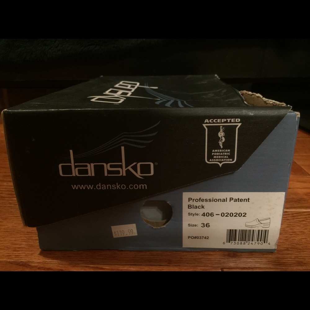 Dansko Professional Patent Black leather shoes.